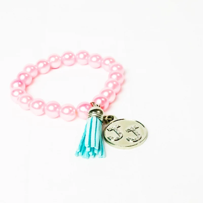 Bangles with gothic-inspired engravings for drama -Jack and Jill Pink Bracelet with Tassel Bling Charm