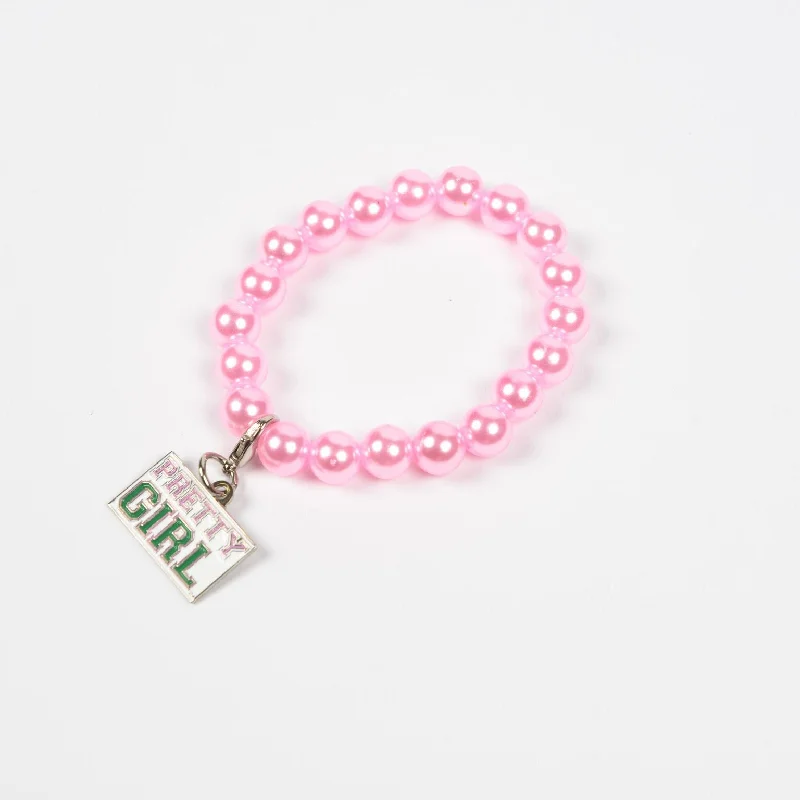 Bracelets with wave engravings for ocean vibes -AKA Pink Pearl Bracelet with Pretty Girl Charm