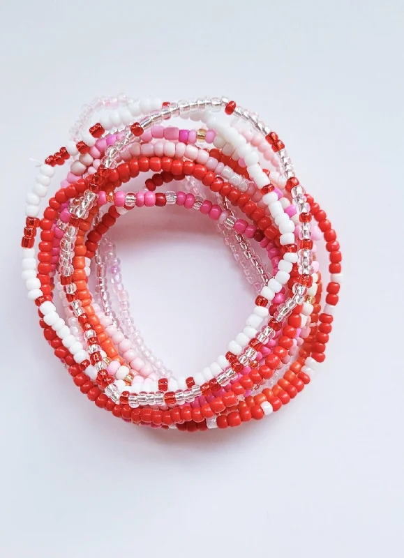 Vintage bangles with intricate filigree metalwork -Coral and Pink beaded Bohemian elasticized bead bracelet